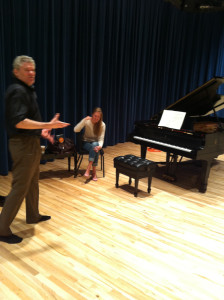 While wearing dark socks, Bill attempting to tell a joke to expert pageturner Maiken Knudsen.